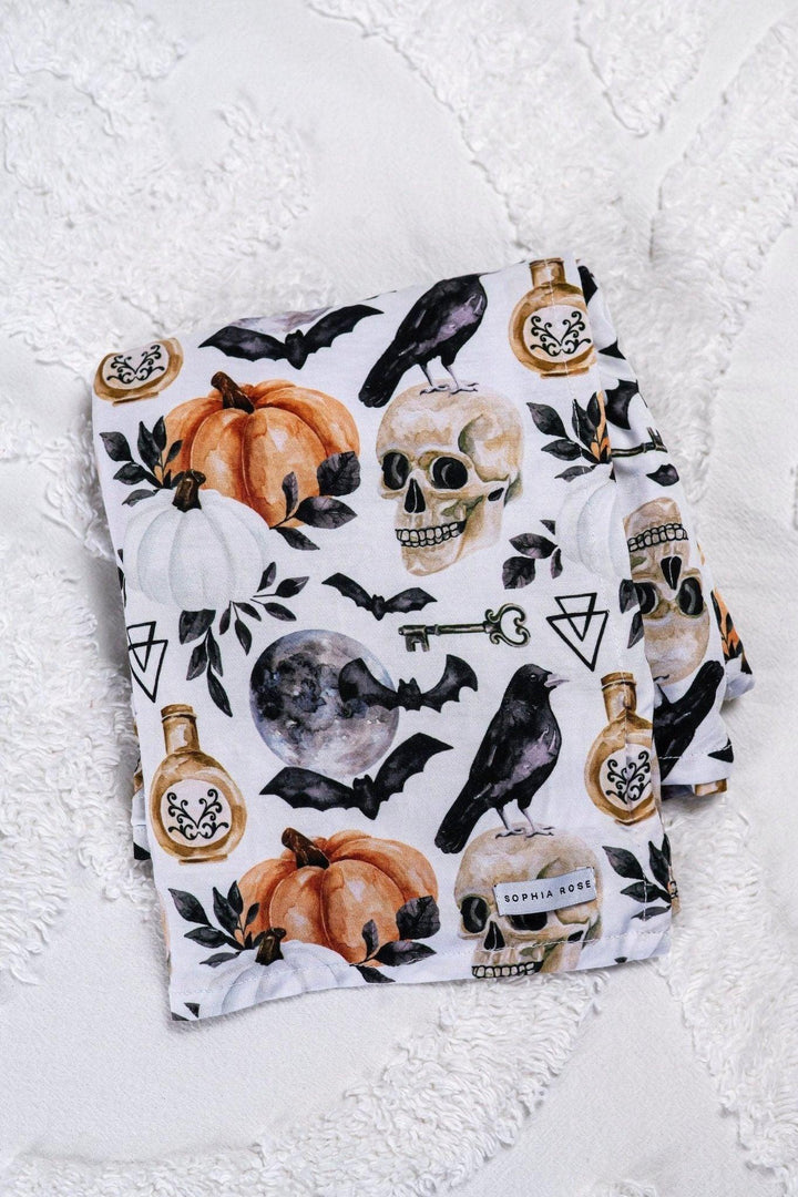 Magical First Halloween with Pumpkin and Skulls Swaddle Blanket - Sophia Rose Children's Boutique